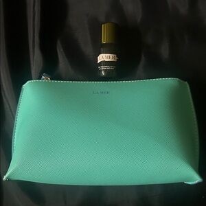 La Mer Cosmetic Bag and Treatment Lotion